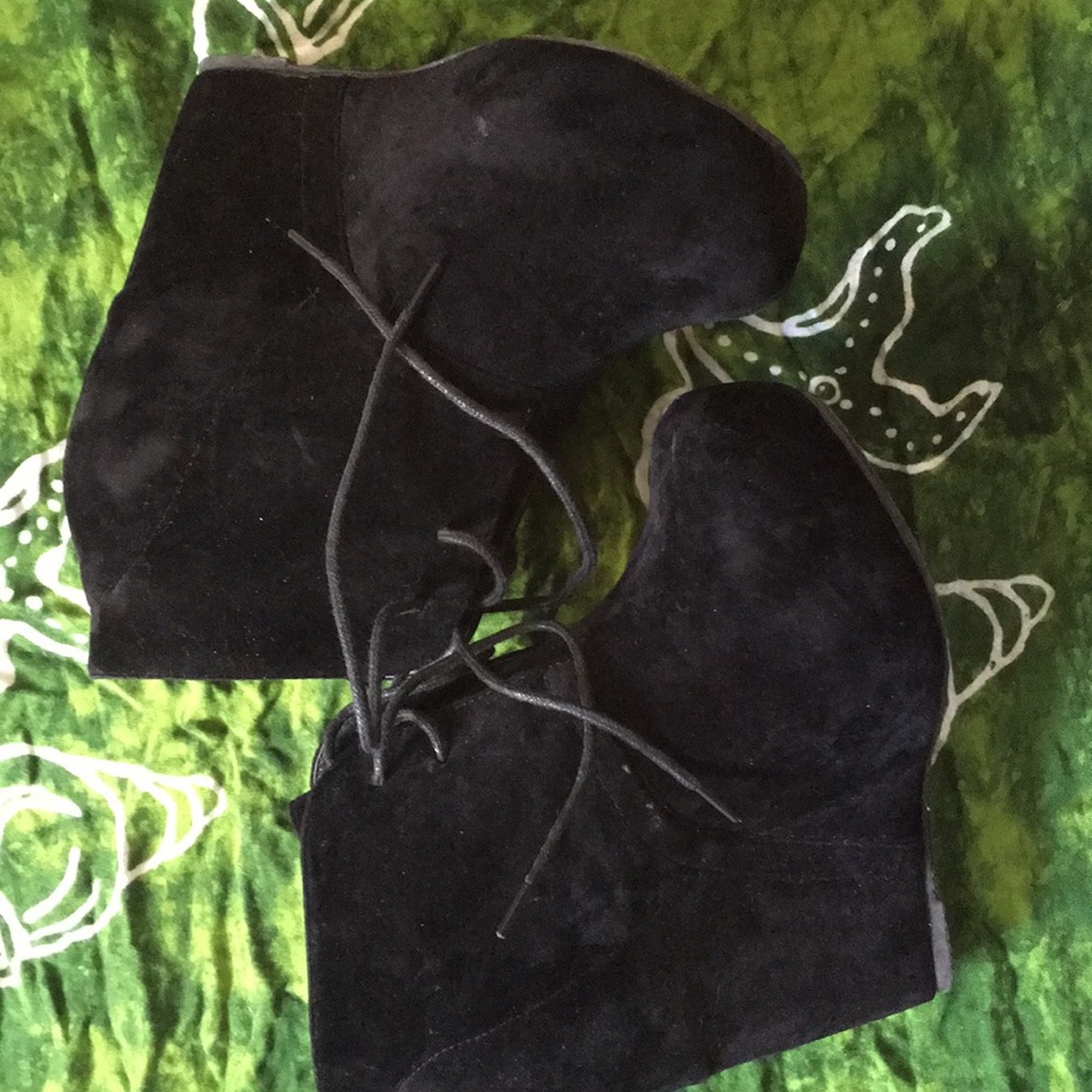 Black Suede heel ankle boots.